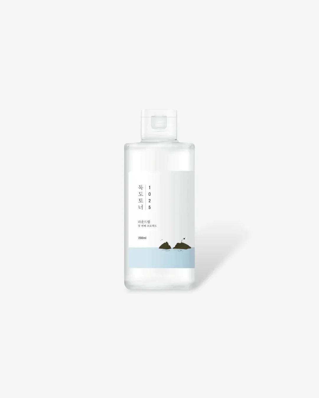 Clear 200ml Dokdo Toner bottle with Korean text and island graphic on white background