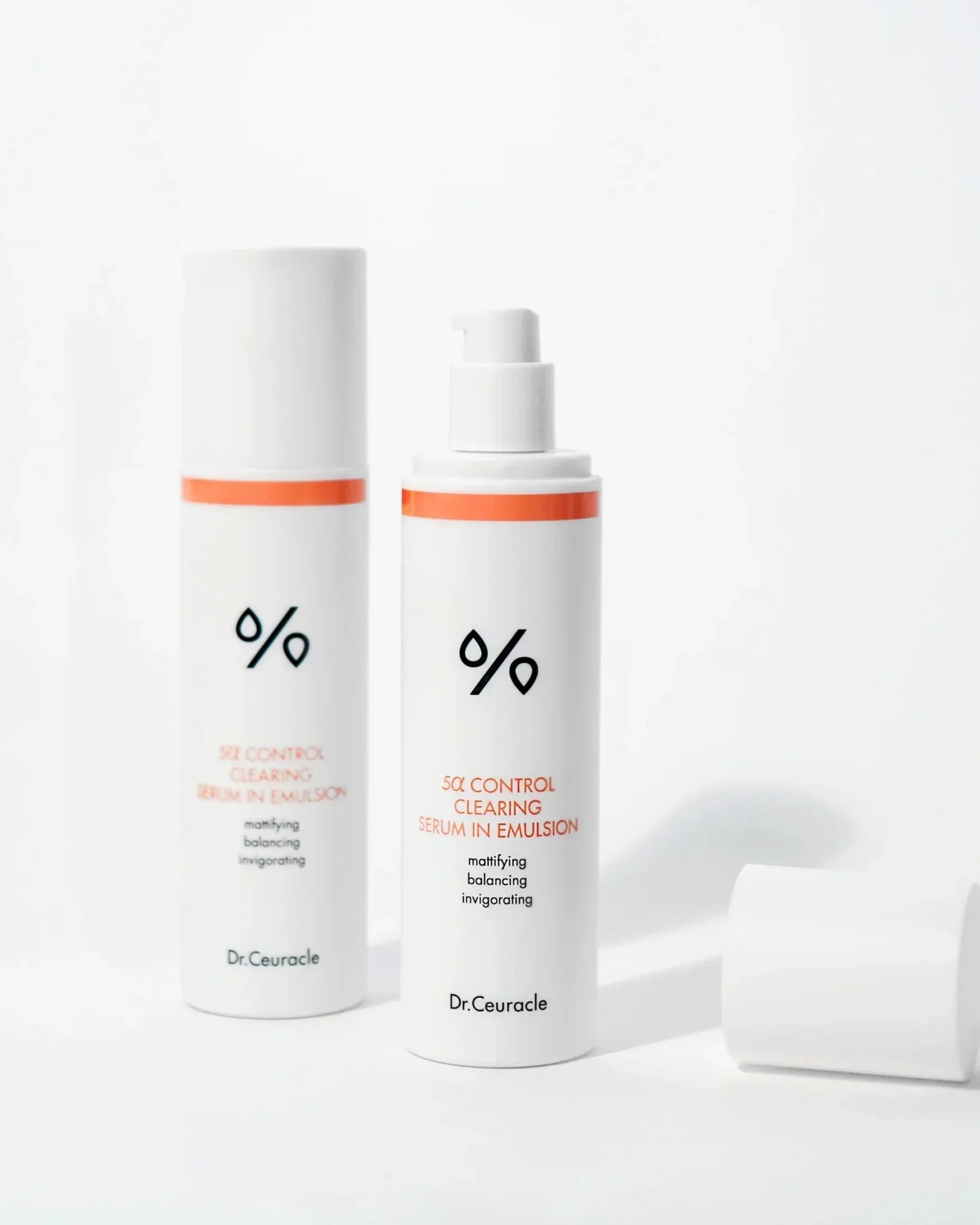Dr. Ceuracle 5α Control Clearing Serum in Emulsion bottles with pump and cap, white and orange design