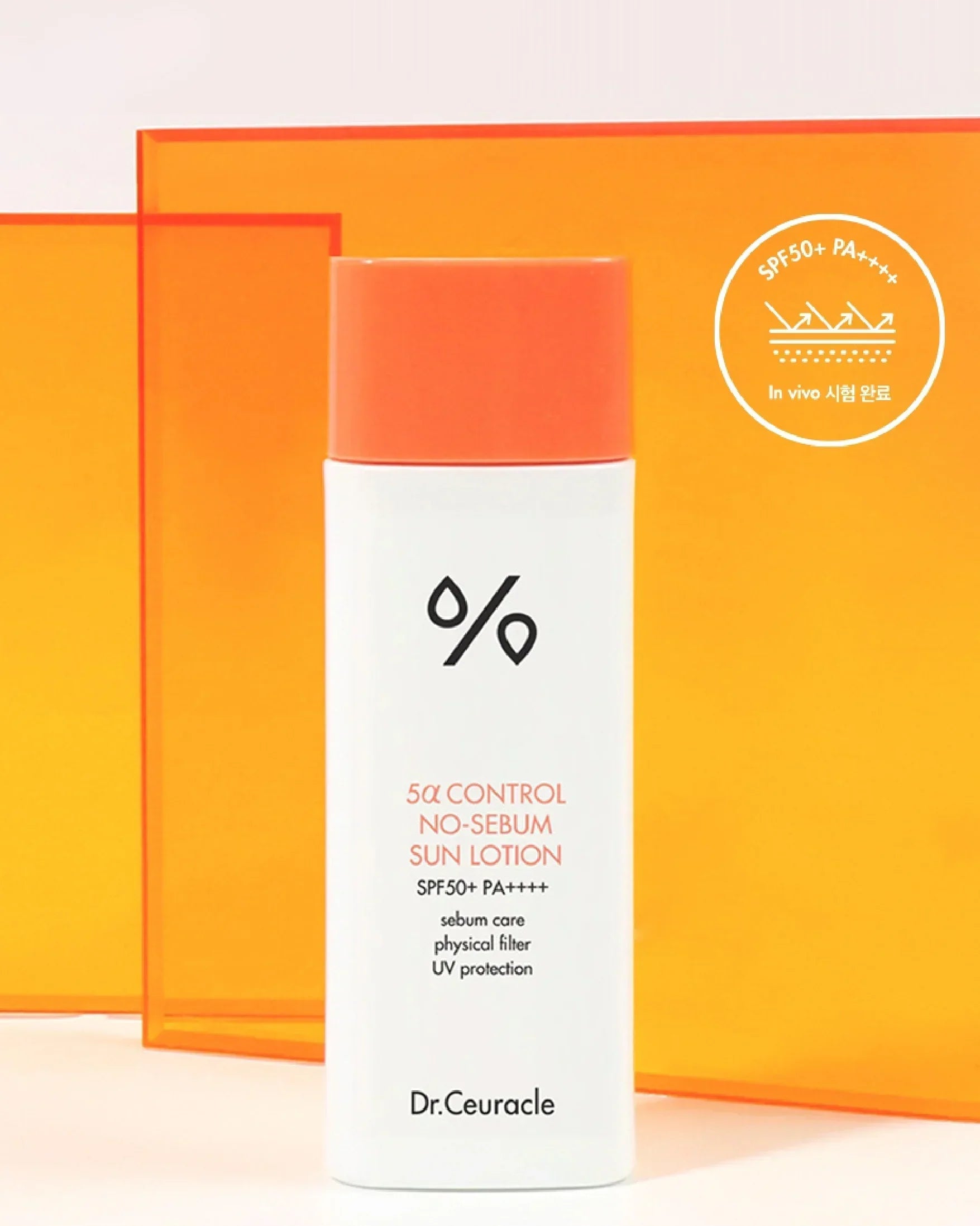 Dr.Ceuracle 5α Control No-Sebum Sun Lotion SPF50+ PA++++ bottle with orange cap on orange background