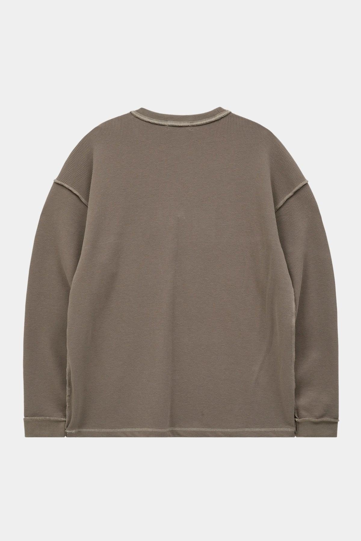 Back view of greyish beige waffle long sleeve t-shirt with visible stitching details