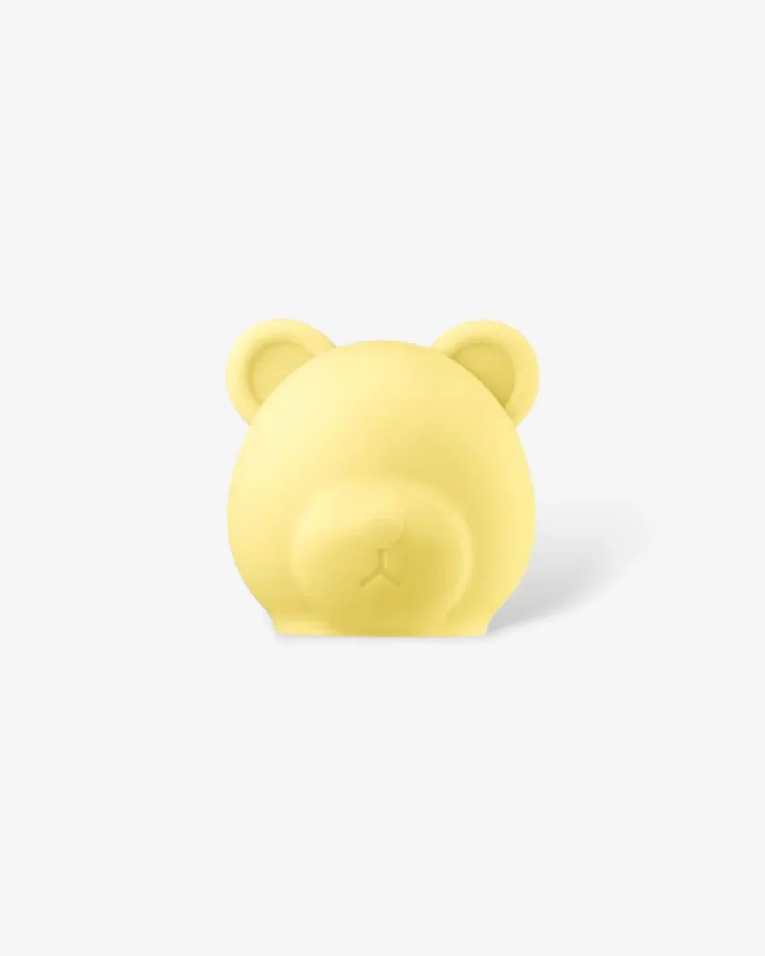 Yellow bear-shaped silicone head case against white background