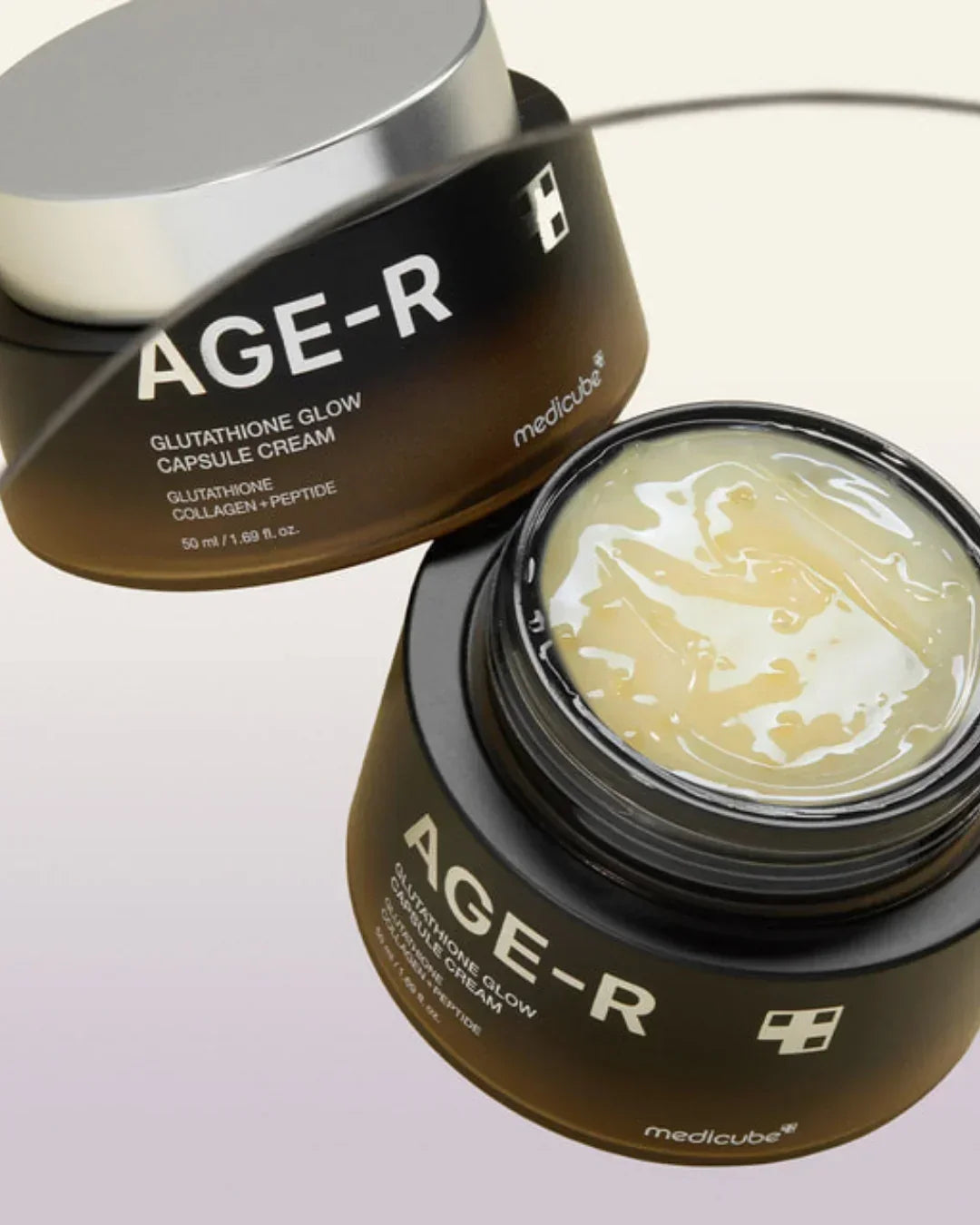 Medicube AGE-R Glutathione Glow Capsule Cream jar with open lid showing cream texture