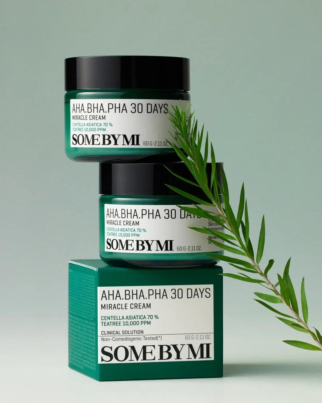 SOME BY MI AHA BHA PHA 30 Days Miracle Cream jars and box with green leaf and minimalist background