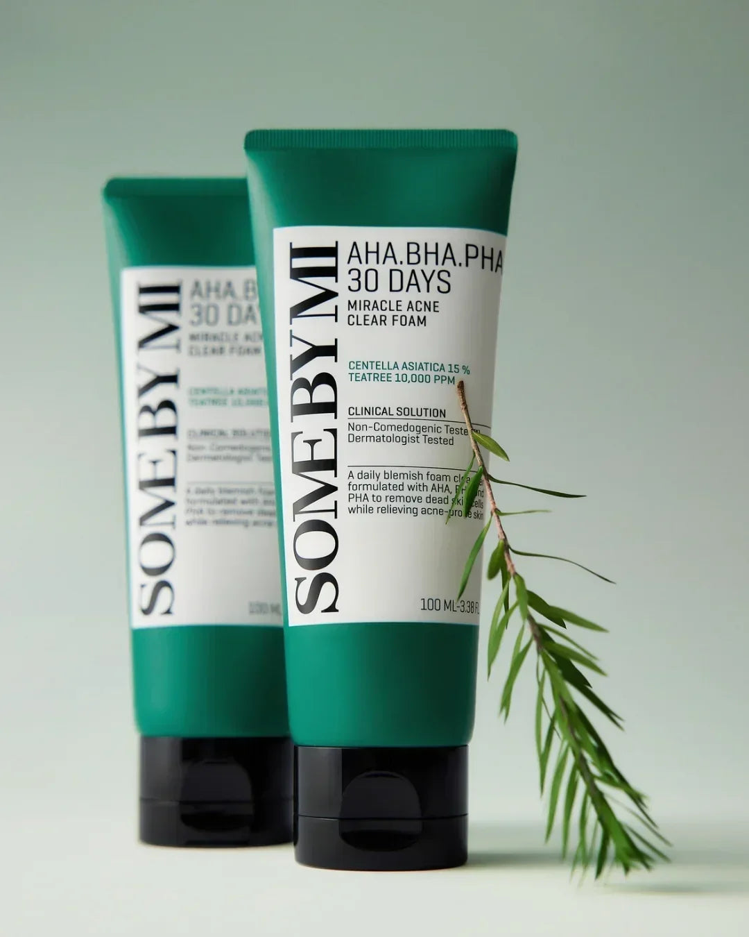 SOME BY MI AHA BHA PHA 30 Days Miracle Acne Clear Foam tubes with green leaves on light green background