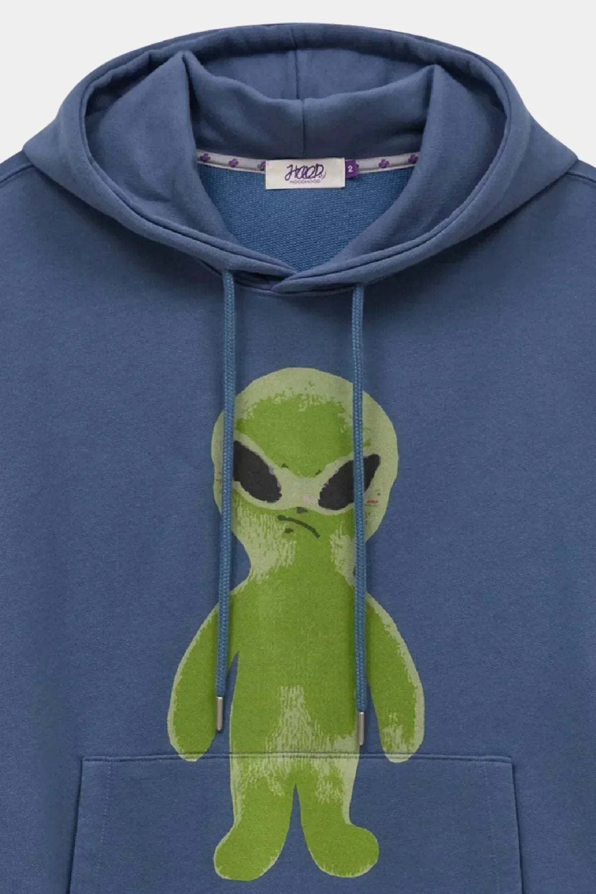Dust blue hoodie with large green alien graphic and blue drawstrings on front