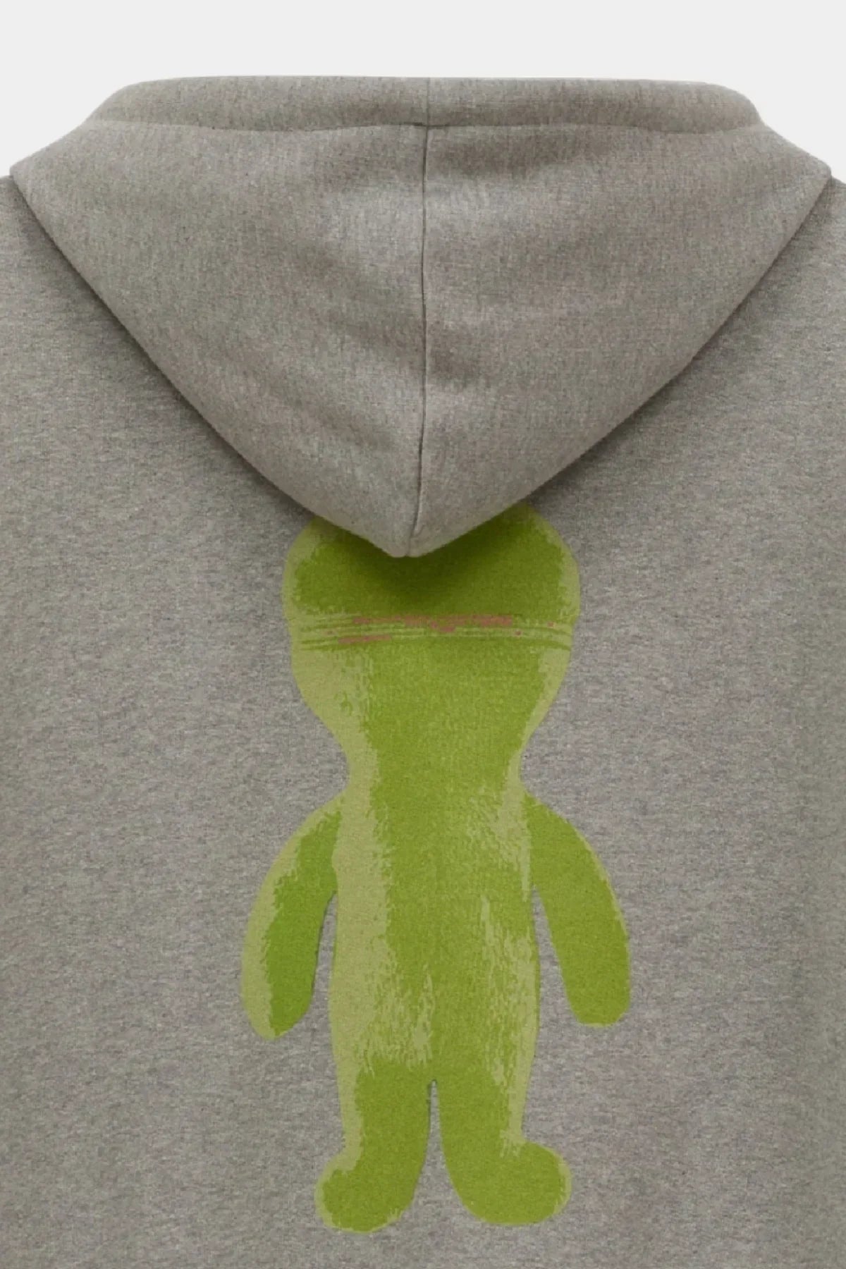 Grey hoodie with a green alien graphic printed on the back under the hood