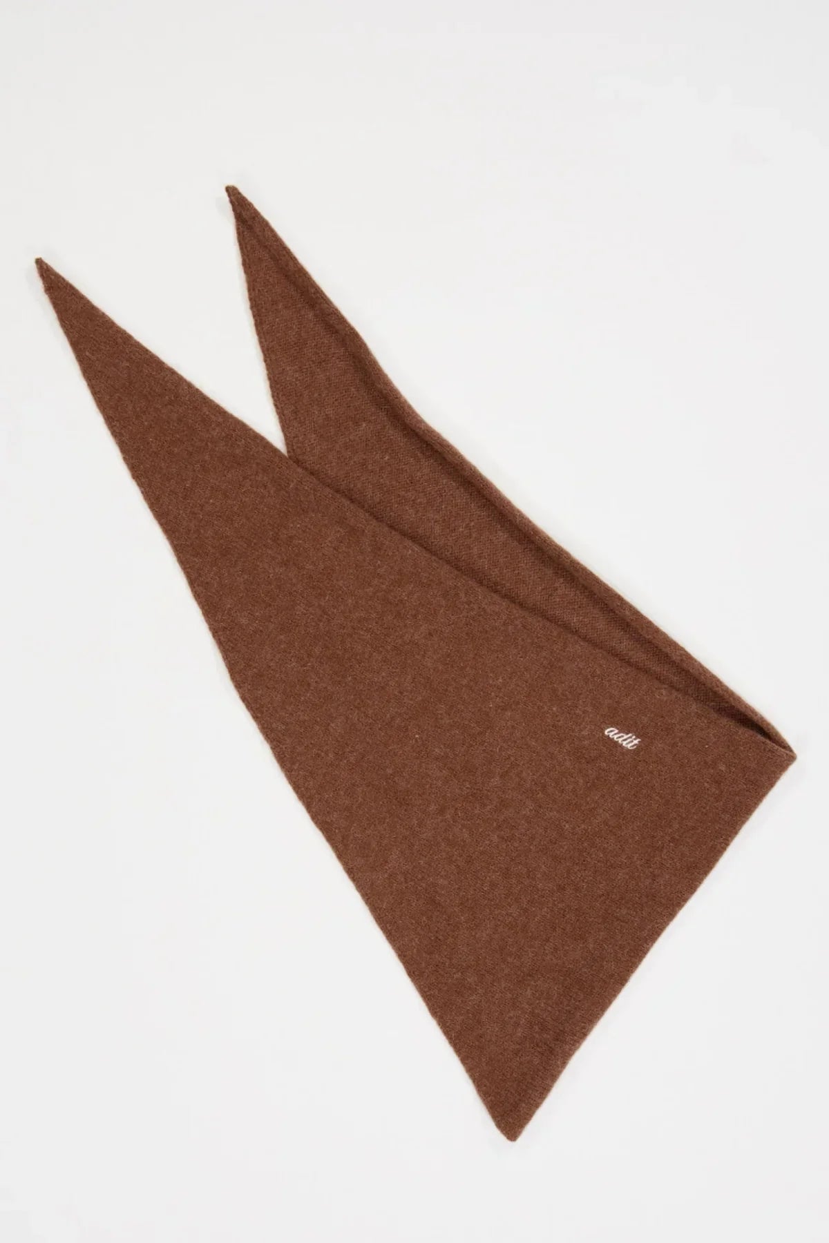 Brown alpaca multi muffler with pointed ends on white background, soft woven fabric