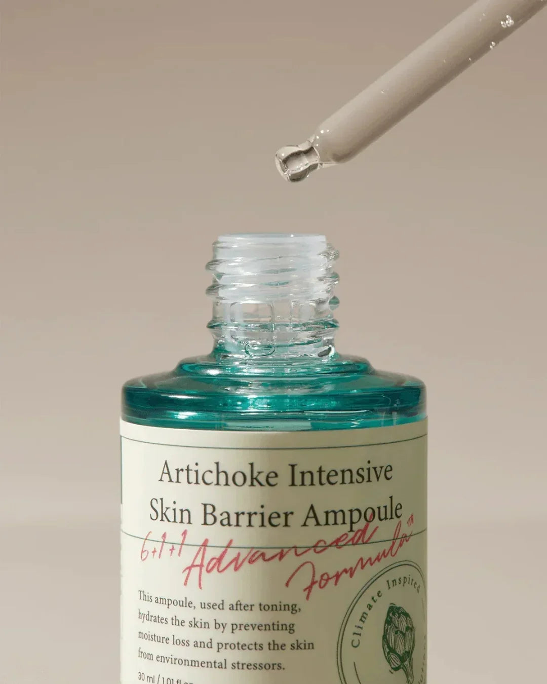 Artichoke Intensive Skin Barrier Ampoule with dropper dispensing clear serum in a teal glass bottle