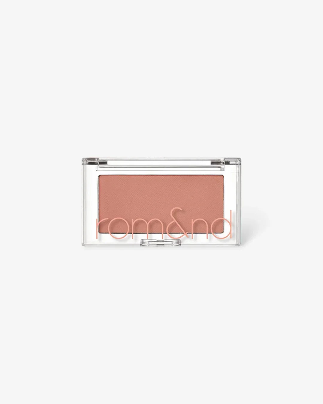 Rom&nd brand peachy coral cream blush compact on white background