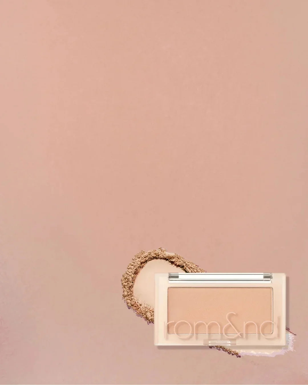 Romand Better Than Cheek Renew blush in Nutty Nude shade with powder smear on peach background
