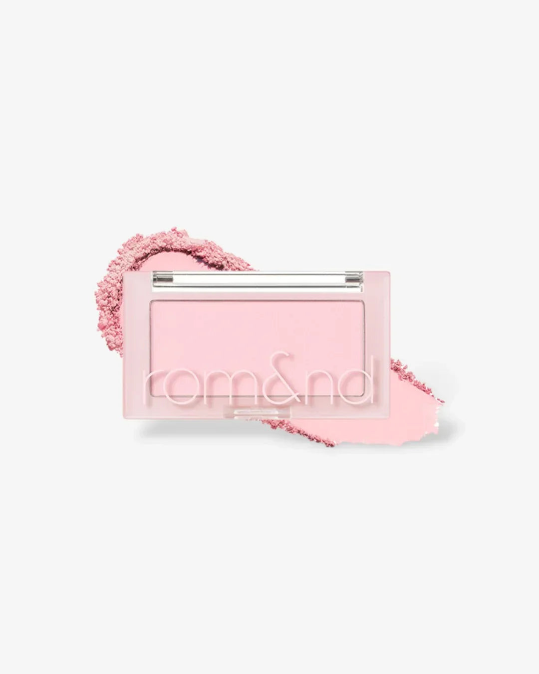 Rom&nd pink powder blush compact on light pink crushed powder background