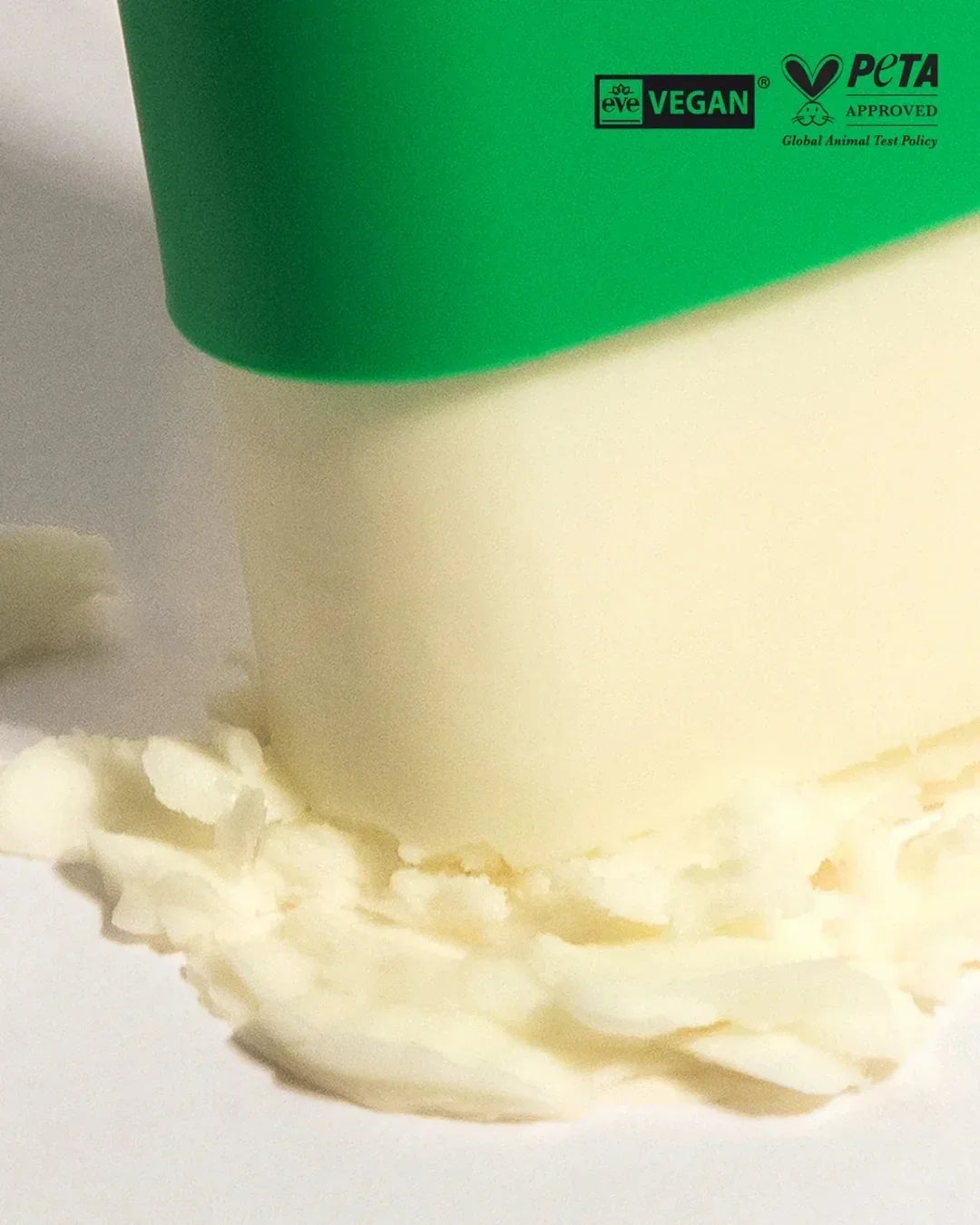 Close-up of Black Bamboo Daily Soothing Sun Shield cream jar with vegan and PETA-approved logos