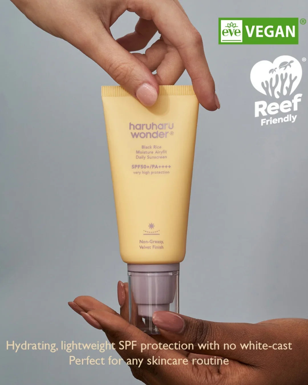 Haruharu Wonder Black Rice Moisture Airyfit Daily Sunscreen SPF50+, vegan, reef friendly, held by hands