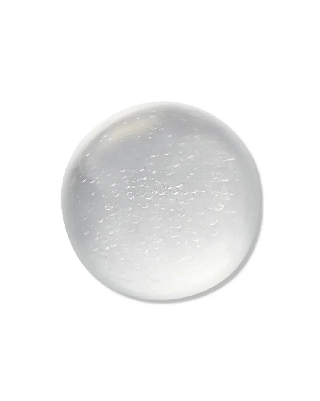 Clear cleansing oil texture with suspended bubbles on white background