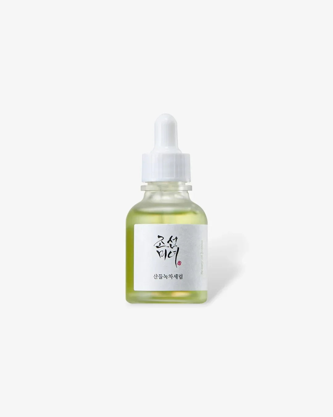 30ml green tea calming serum in frosted glass dropper bottle with white label and Korean text