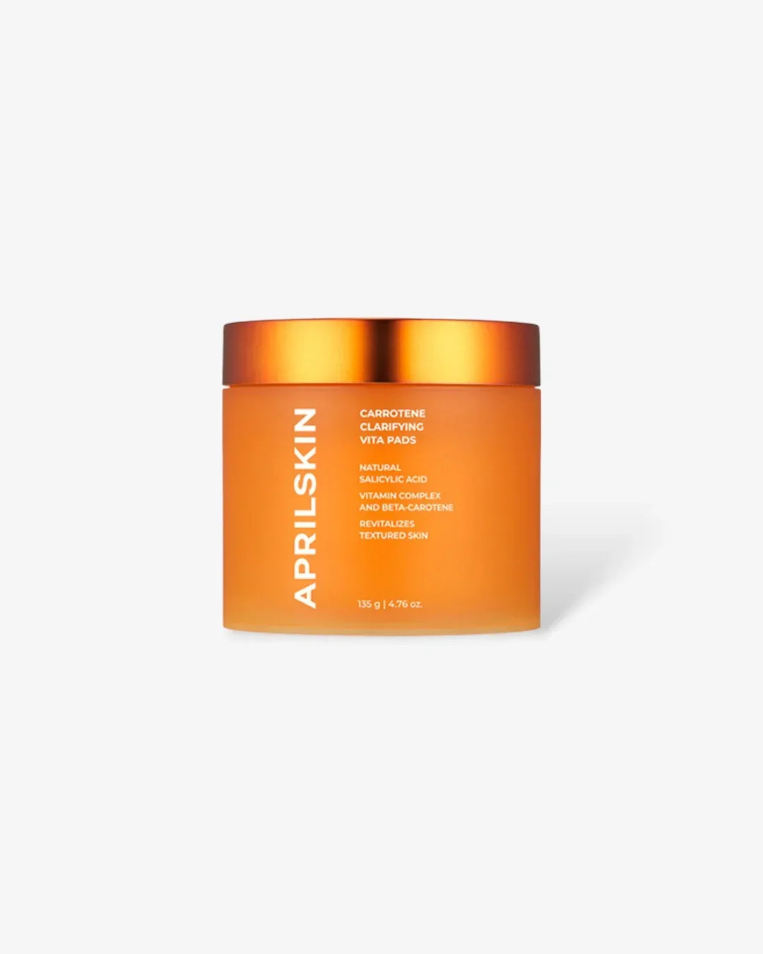 Orange jar of Aprilskin Carotene Clarifying Vita Pads with metallic lid on white background