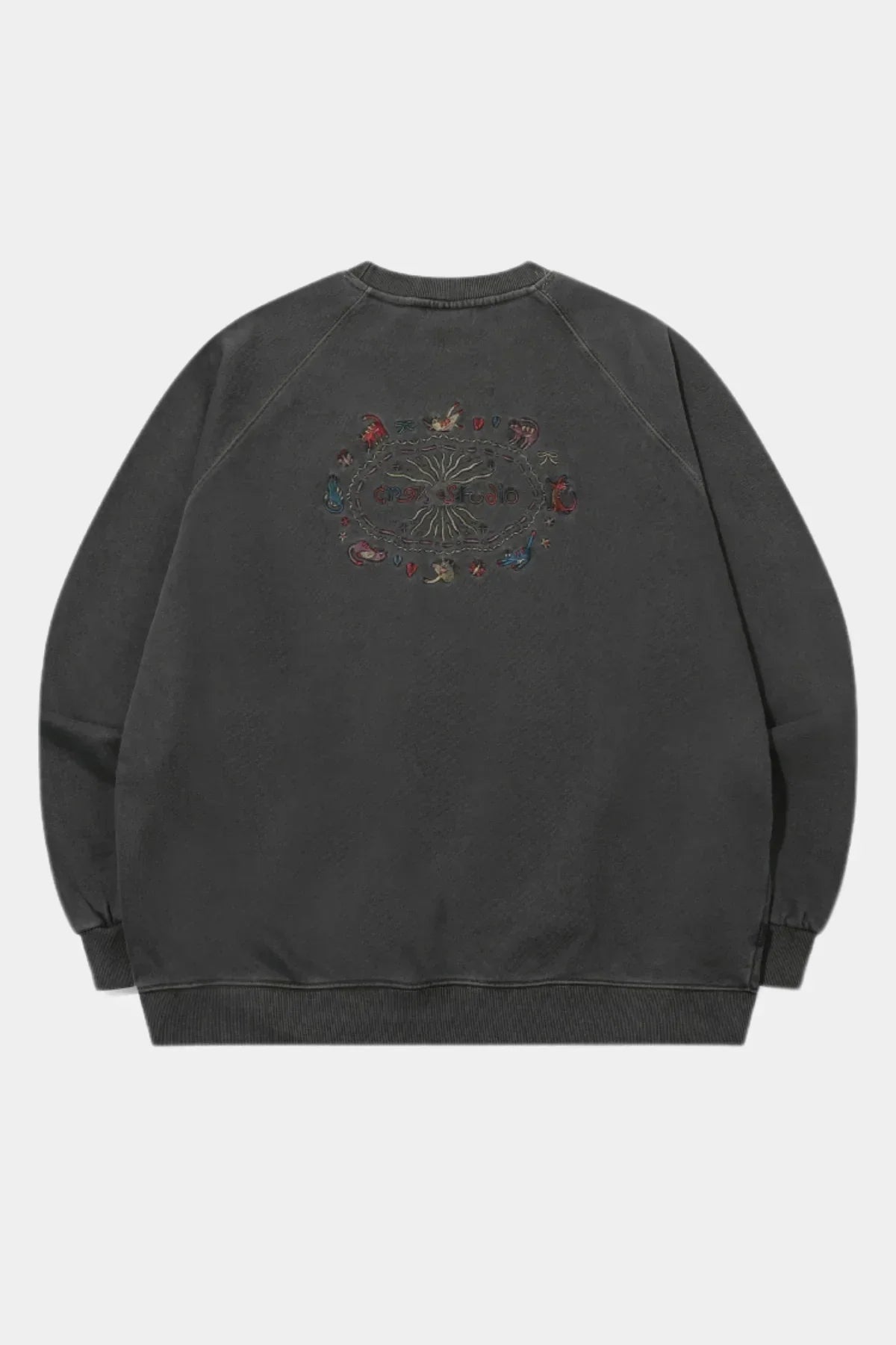 Smoke black raglan sweatshirt with colorful embroidered cat and studio design on back