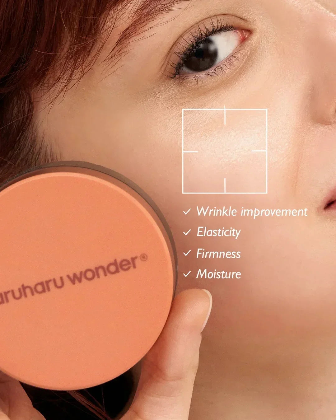 Close-up of woman holding Maruharu Wonder skincare cream, highlighting wrinkle improvement and skin firmness