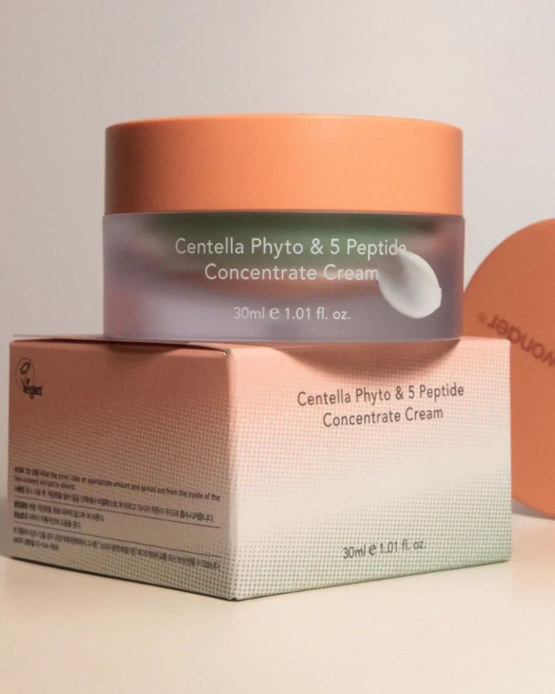 Centella Phyto & 5 Peptide Concentrate Cream 30ml with orange lid on matching box
