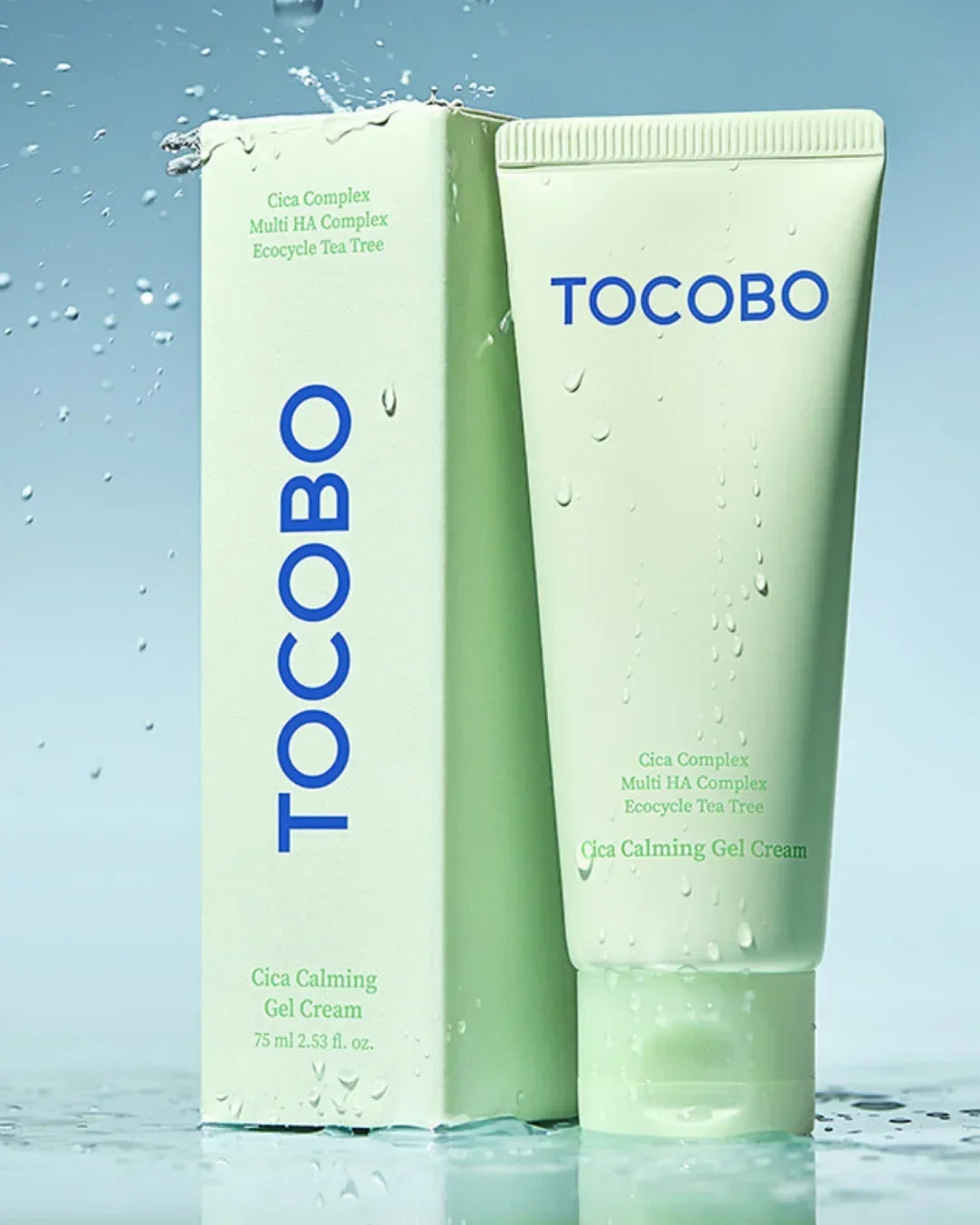TOCOBO Cica Calming Gel Cream 75ml with water droplets and packaging against blue background