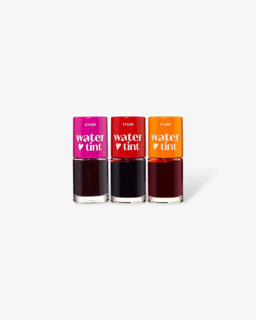 Three Etude Water Tint lip tints in pink, red, and orange caps on white background