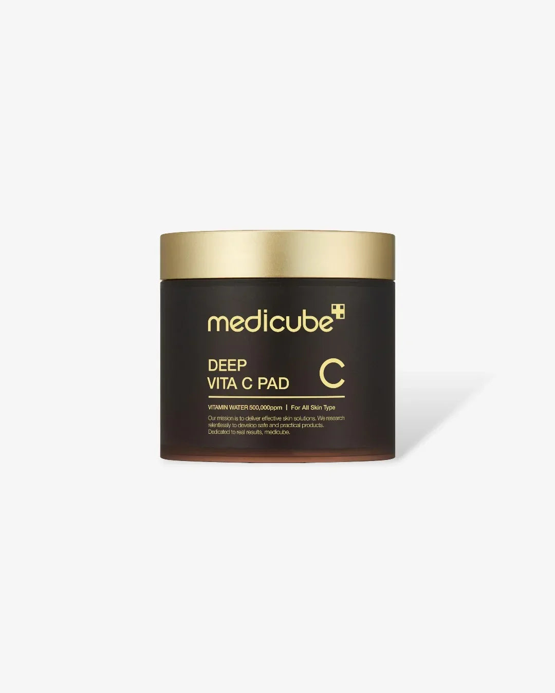 Medicube Deep Vita C Pad with gold lid and dark brown container for all skin types