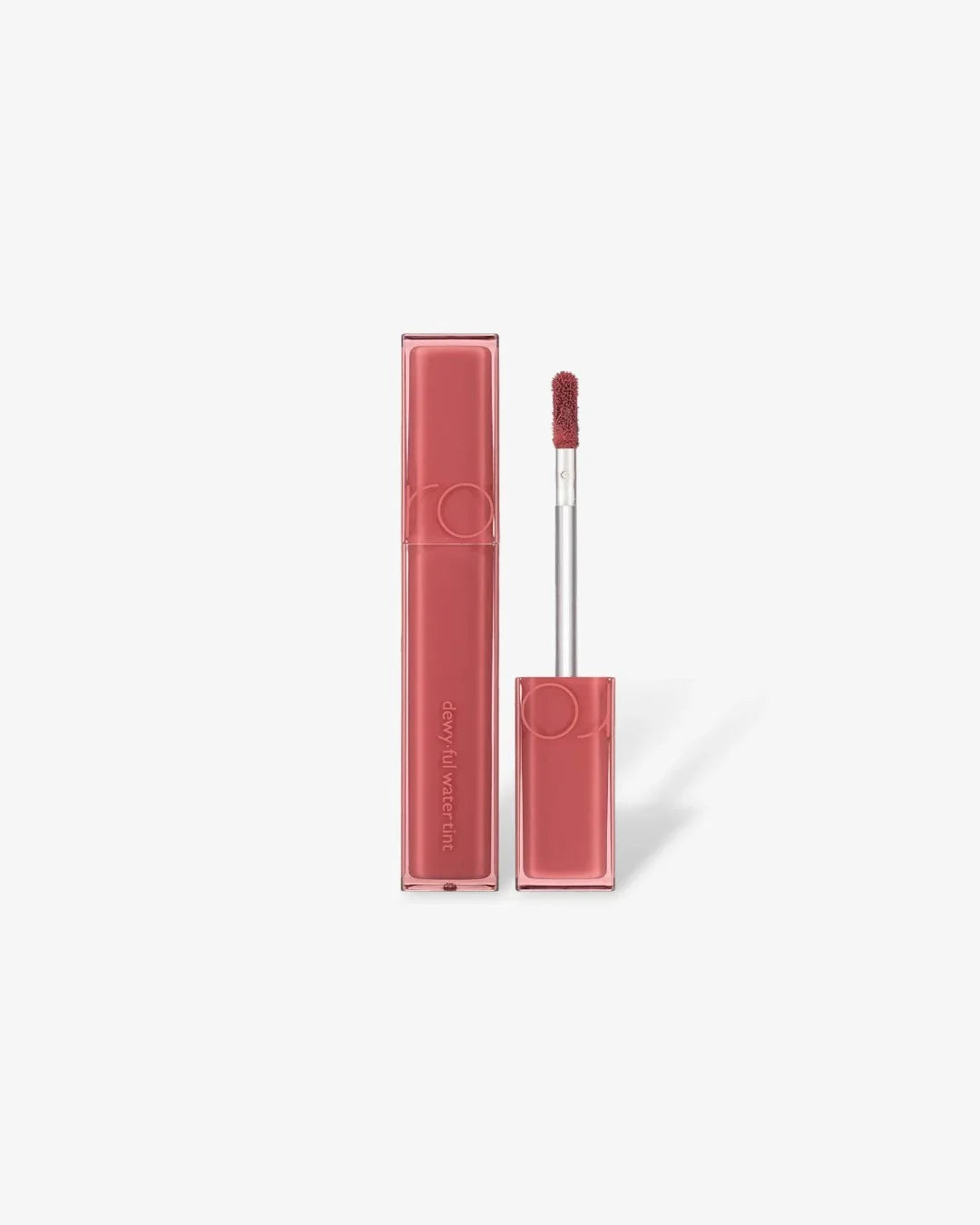 Dewy-ful water tint lip gloss in mauve pink with applicator on white background