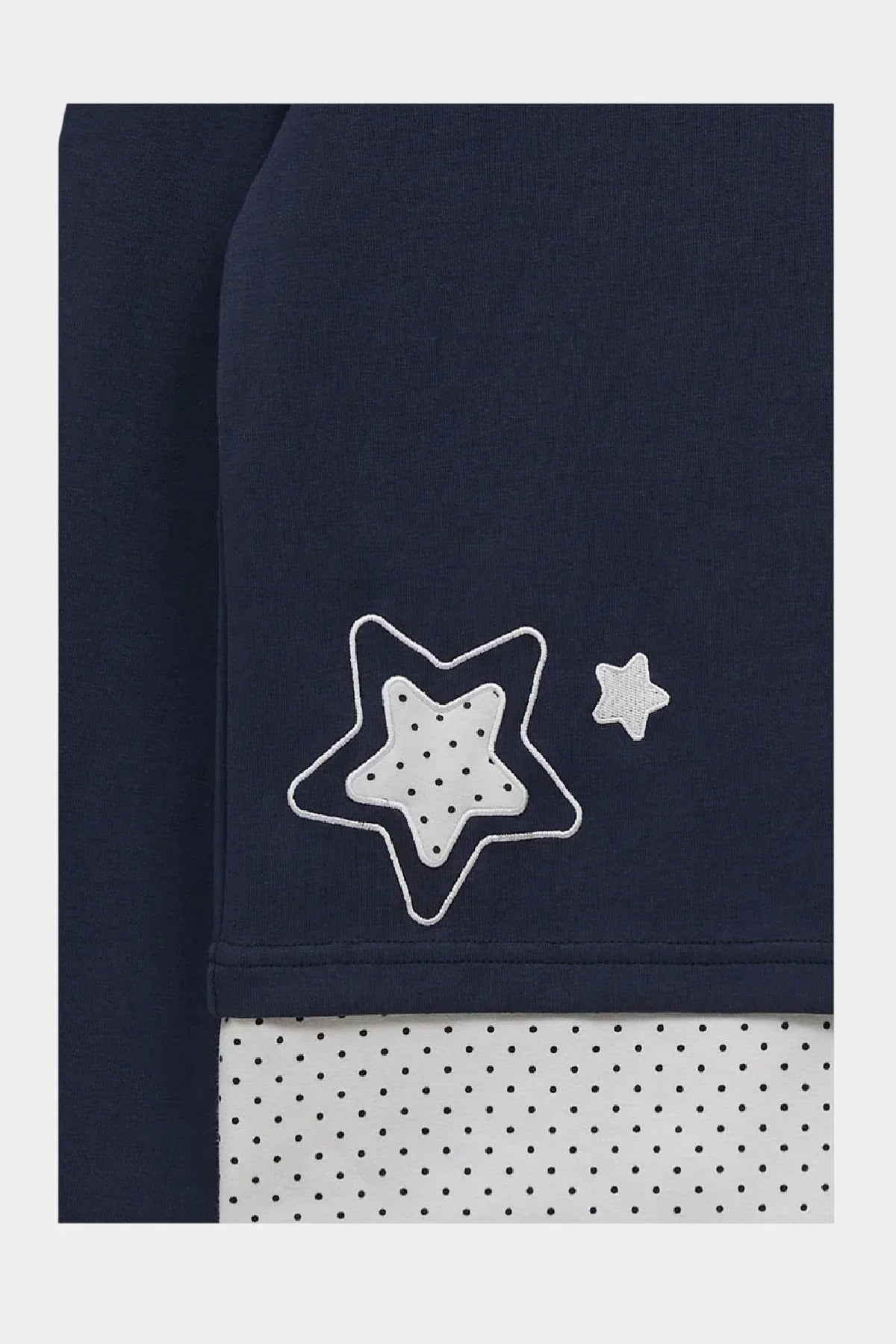 Navy long sleeve t-shirt with layered white polka dot star applique detail