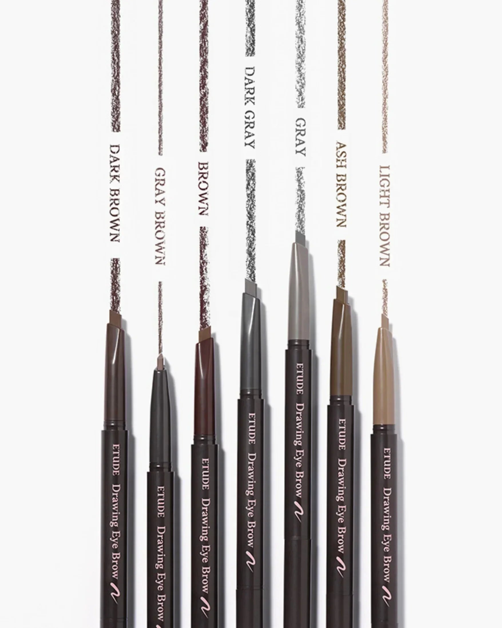 Six Etude Drawing Eyebrow pencils in shades dark brown, gray brown, brown, dark gray, ash brown, and light brown with strokes