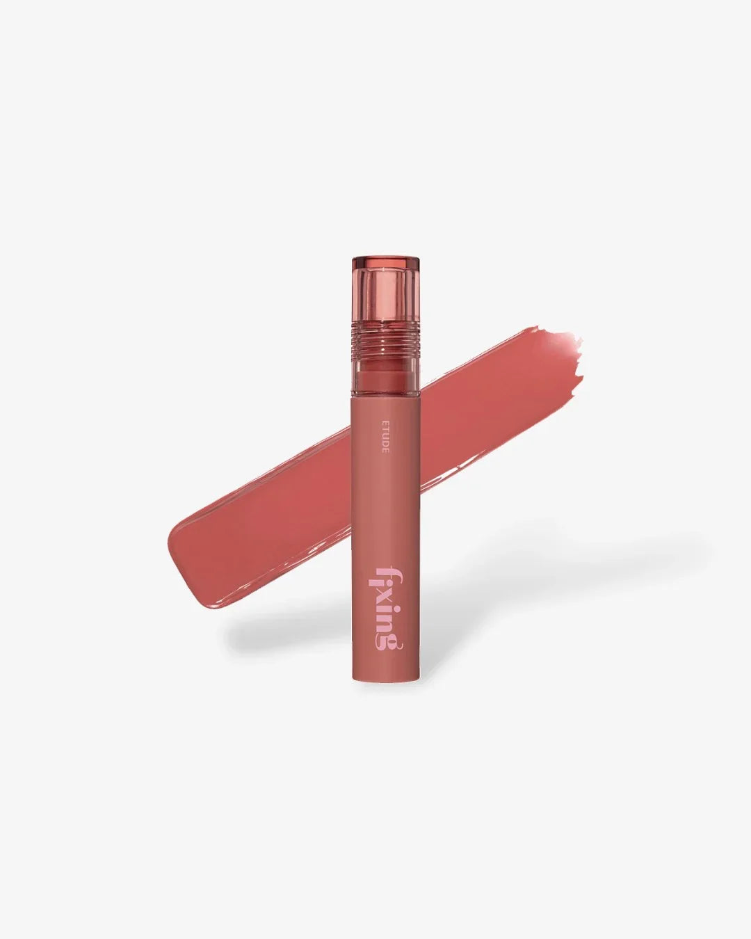 Etude Fixing lipstick in salmon brick color with matching lip swatch on white background
