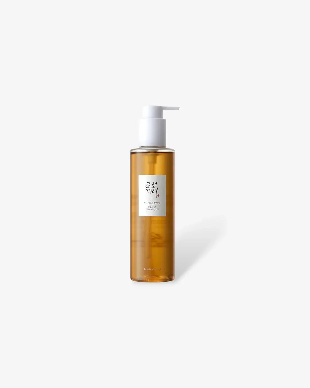 Bottle of ginseng cleansing oil with white pump on white background