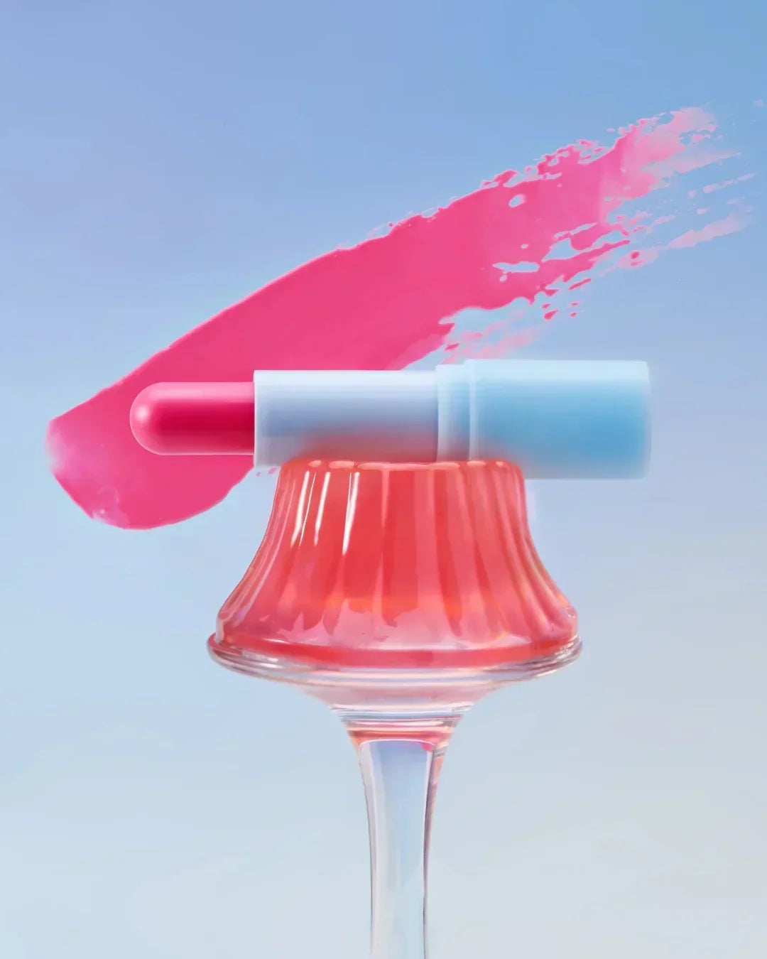 Pink tinted lip balm on a textured glass pedestal with a pink paint swipe background