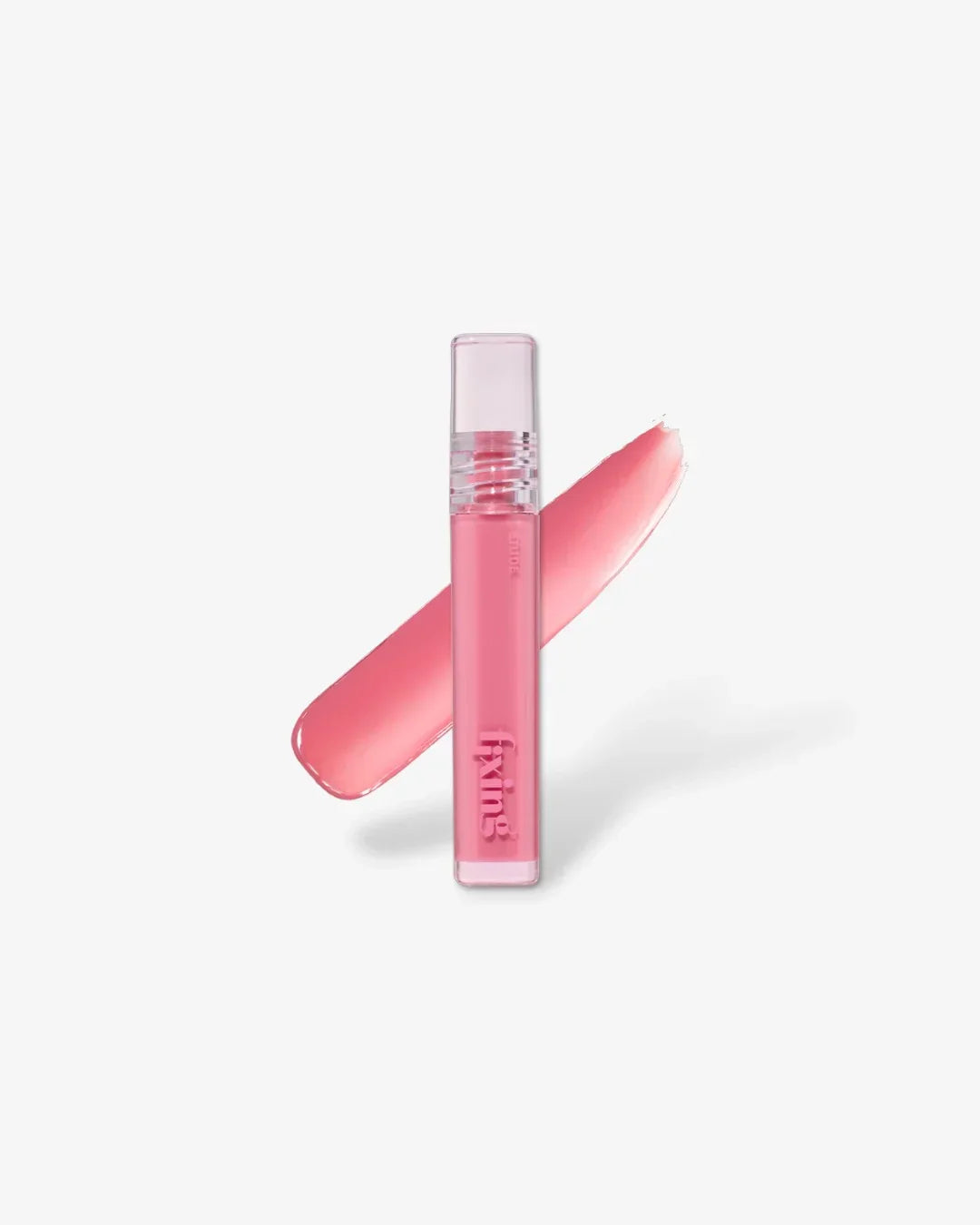 Mellow pink lip tint gloss tube with swatch on white background, beauty makeup product