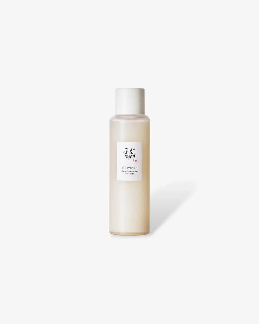 Glow Replenishing Rice Milk bottle with Korean text on a white background