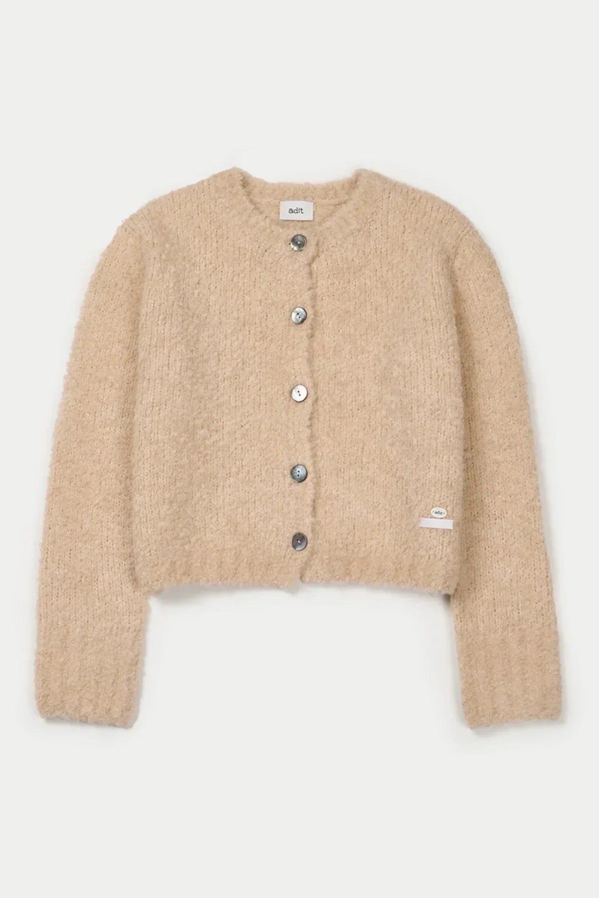 Beige soft knit grandma cardigan with round neckline and front buttons on white background