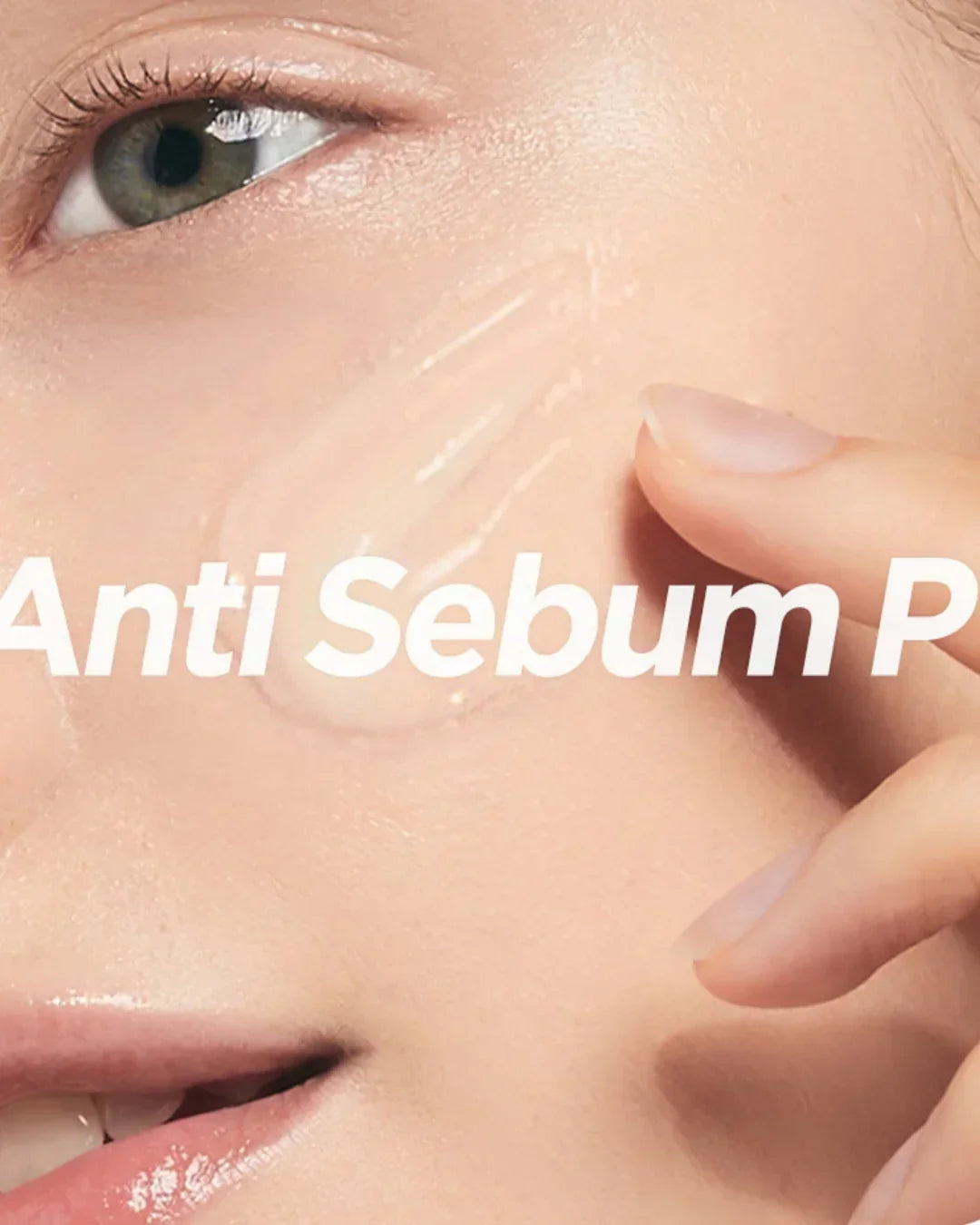 Close-up of woman applying clear anti-sebum cream on cheek, skincare beauty treatment