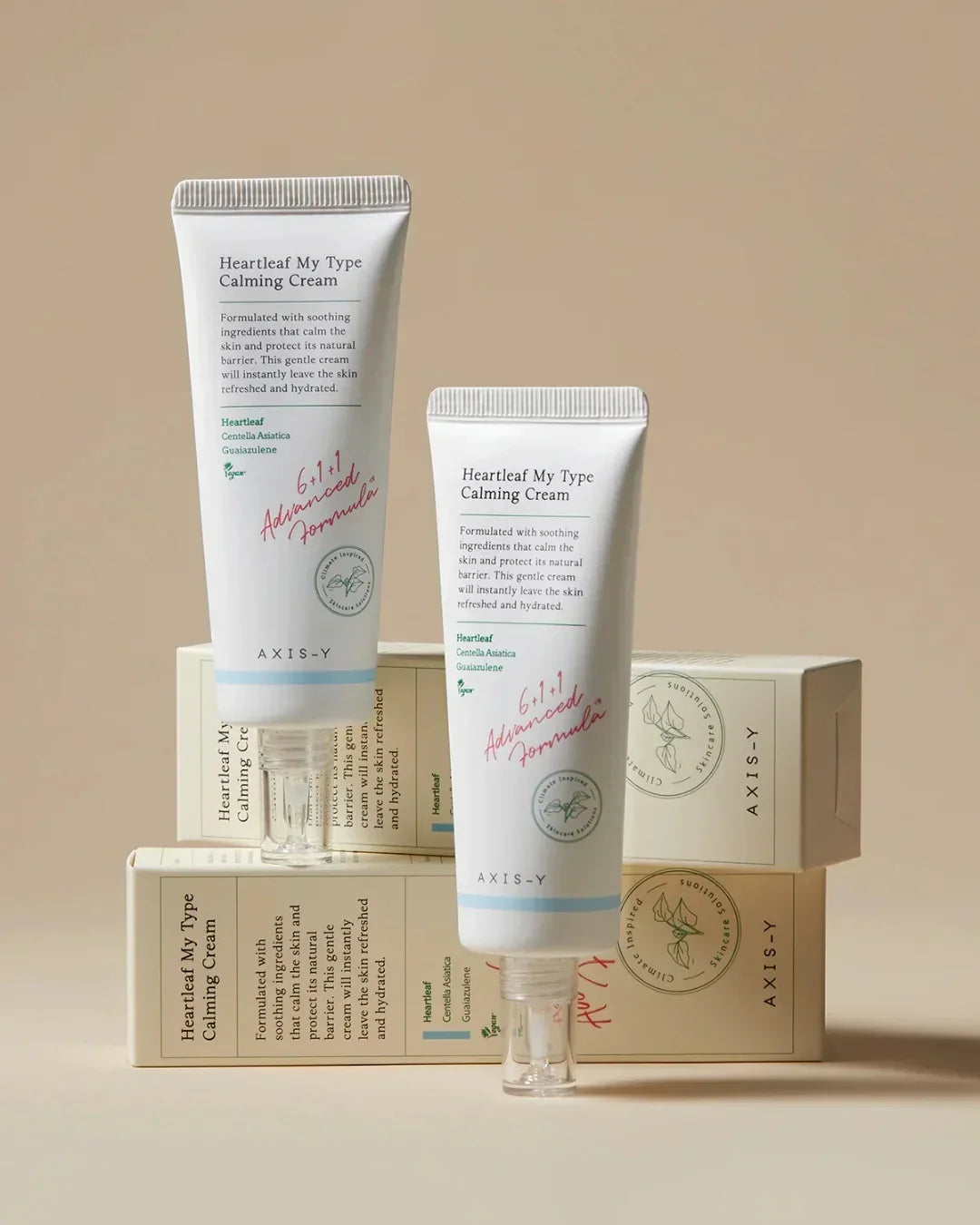 Two tubes of Heartleaf My Type Calming Cream with beige packaging and product boxes