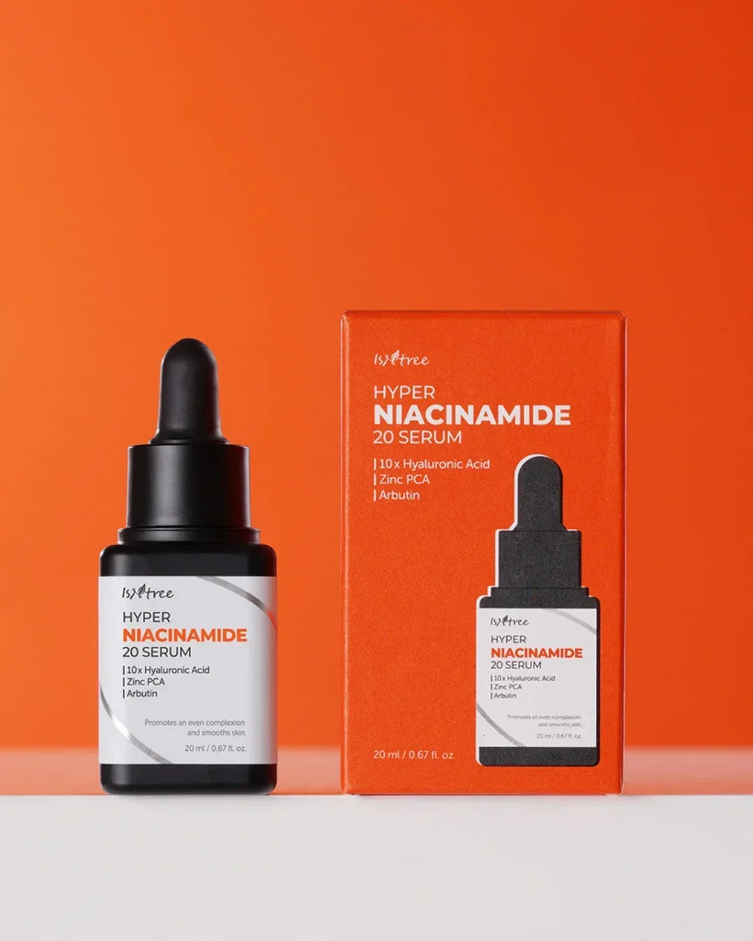 Isntree Hyper Niacinamide 20 Serum bottle and orange packaging on white surface