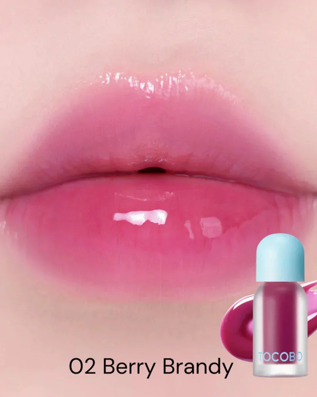 Close-up of glossy lips wearing Tocobo Juicy Berry Plumping Lip Oil in 02 Berry Brandy shade