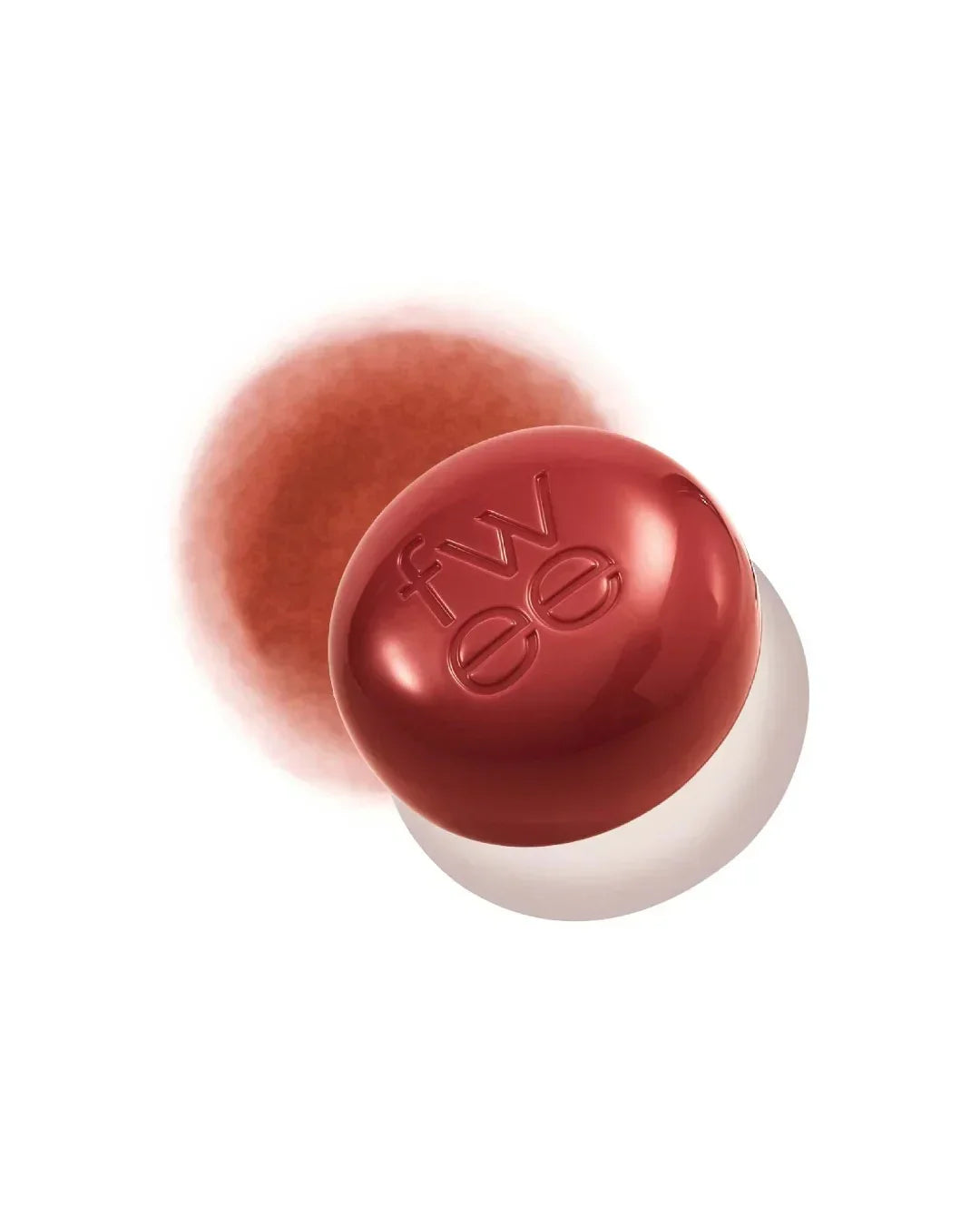 Round red lip and cheek tint with embossed letters fw ee on white background