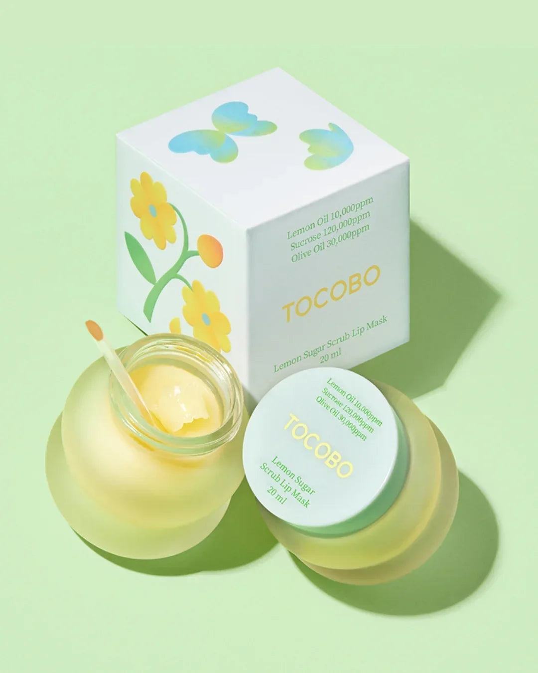 TOCOBO Lemon Sugar Scrub Lip Mask 20ml with yellow cream, spatula, and white box with floral and butterfly design