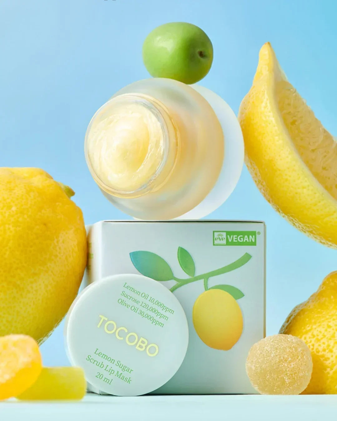 Tocobo Lemon Sugar Scrub Lip Mask 20ml with lemon and green apple on blue background, vegan skincare