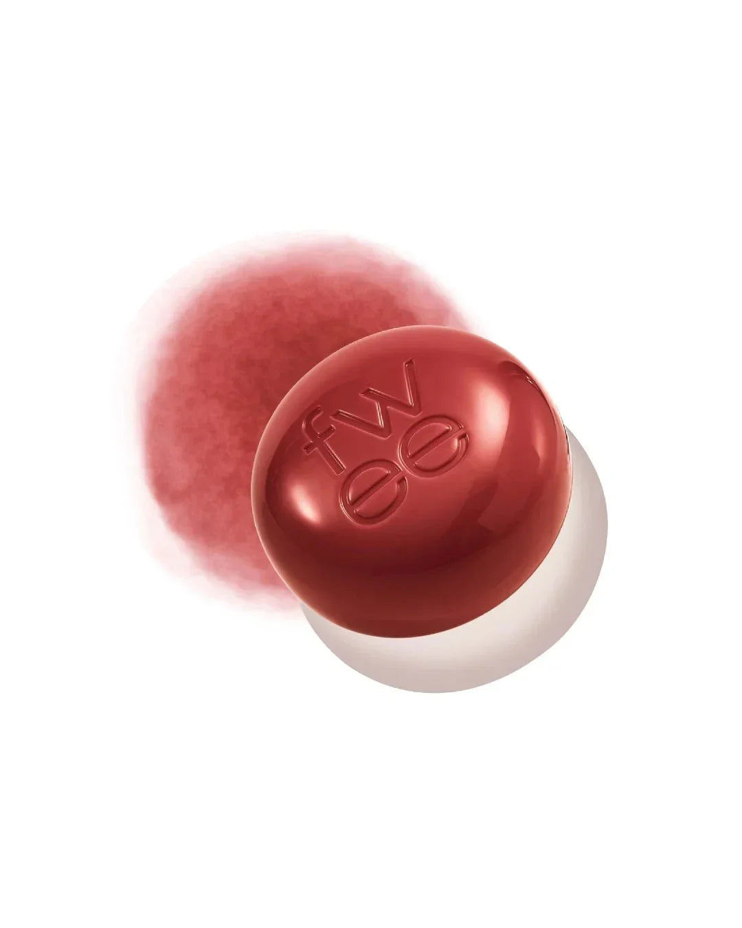 Small round lip and cheek pudding pot in glossy reddish-brown with smeared product on white background