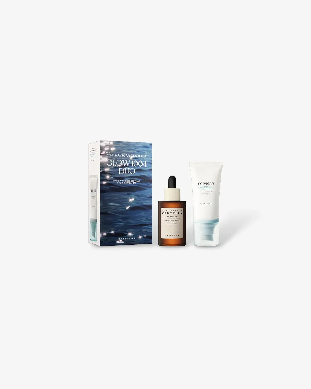 Madagascar Centella Glow 1004 Duo skincare set with serum ampoule and cream on white background