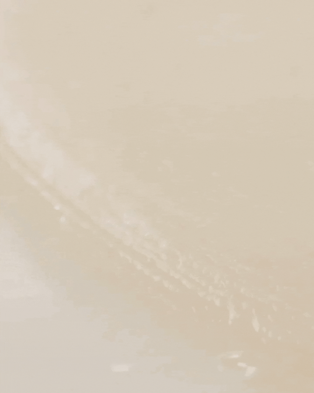 Close-up of Madagascar centella watergel sheet ampoule mask texture showing translucent gel and smooth surface