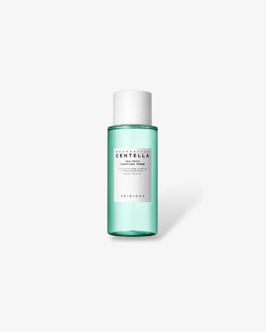 Green bottle of Madagascar Centella Tea-Trica Purifying Toner by SKIN1004 on white background