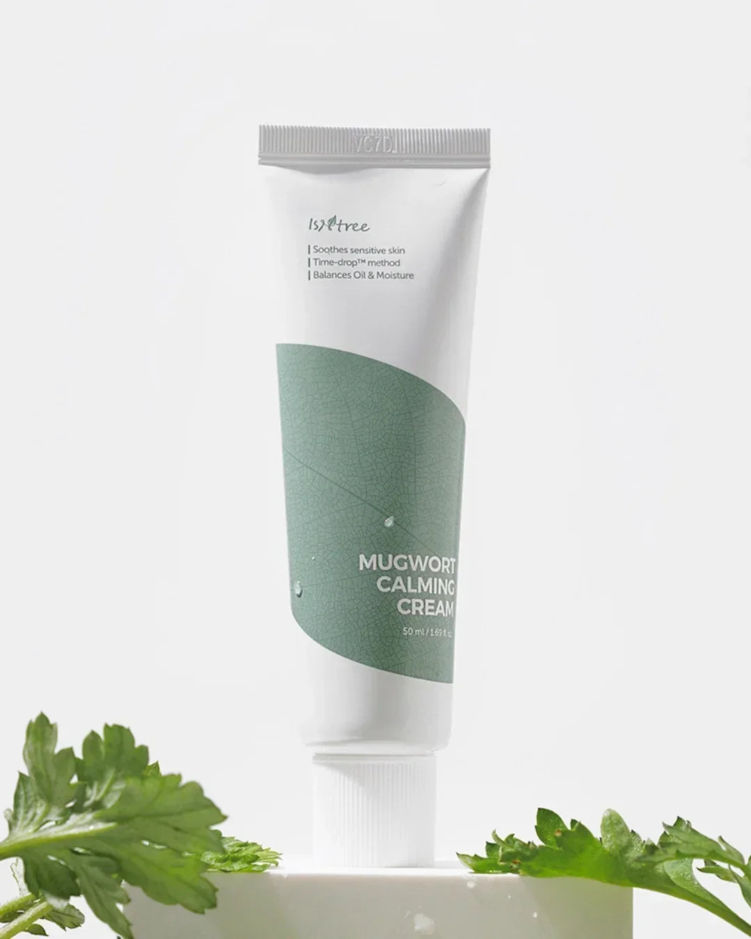 Isntree Mugwort Calming Cream 50ml tube for sensitive skin with green label and fresh mugwort leaves
