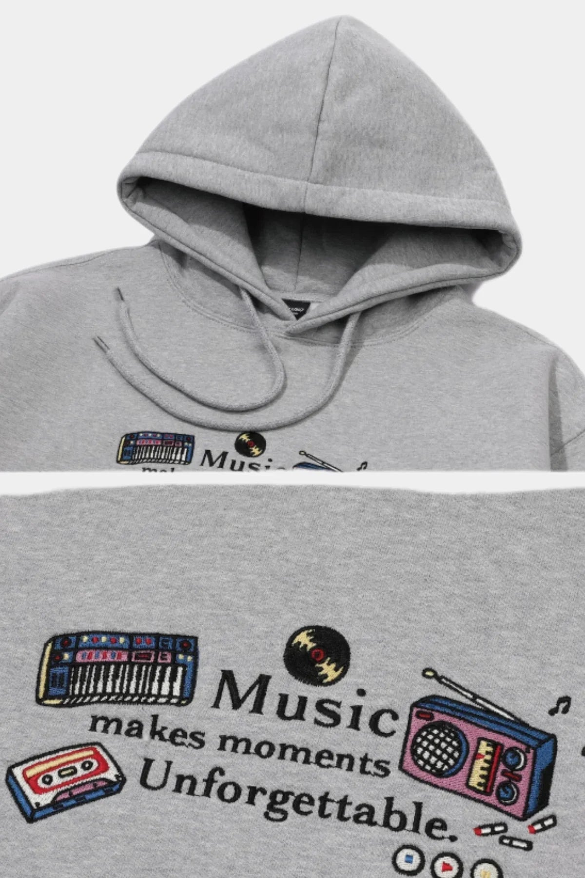 Gray hoodie with embroidered music-themed design featuring keyboard, vinyl record, cassette tape, radio, and text 'Music makes moments Unforgettable'