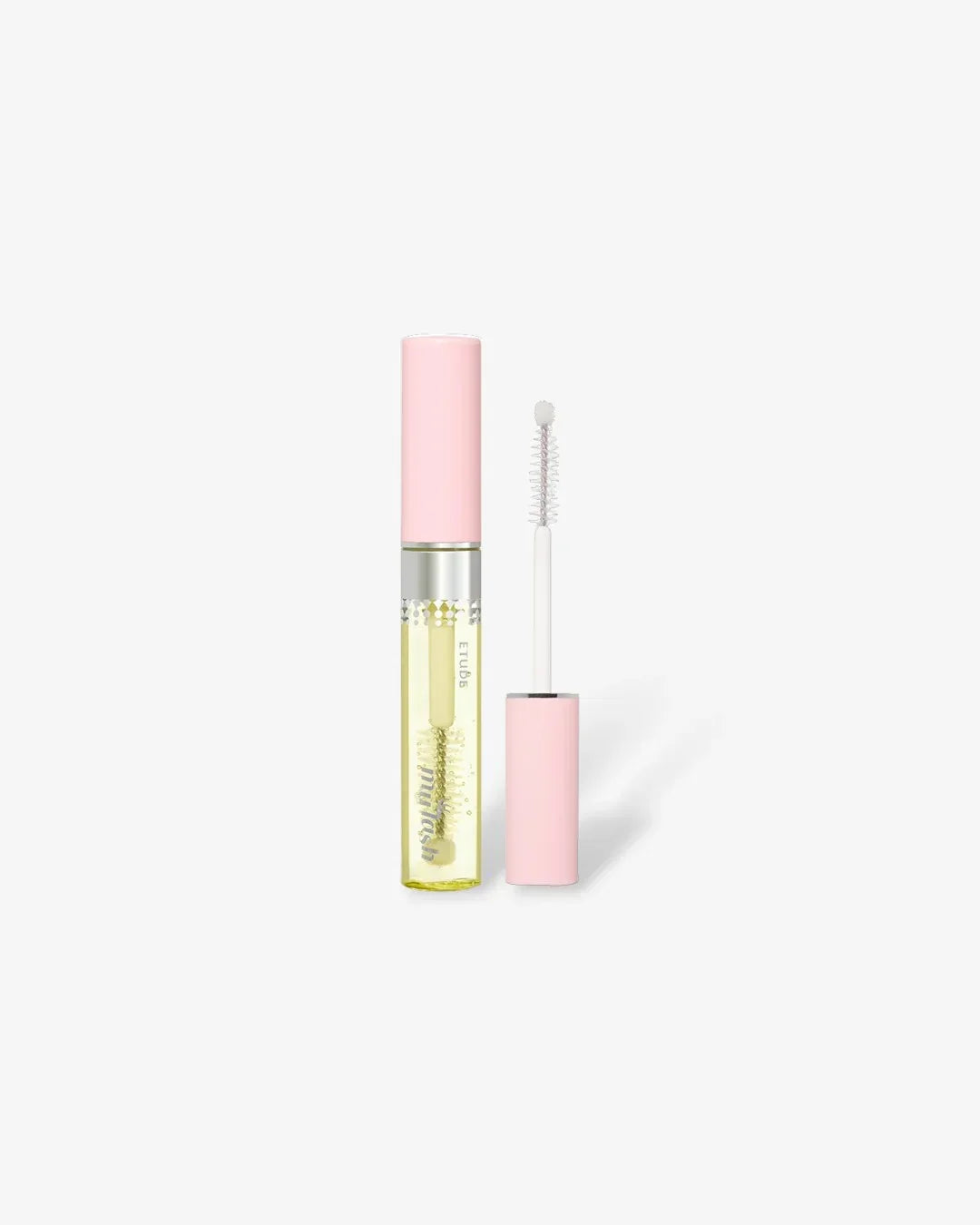 Clear eyelash serum with pink cap and applicator brush on white background