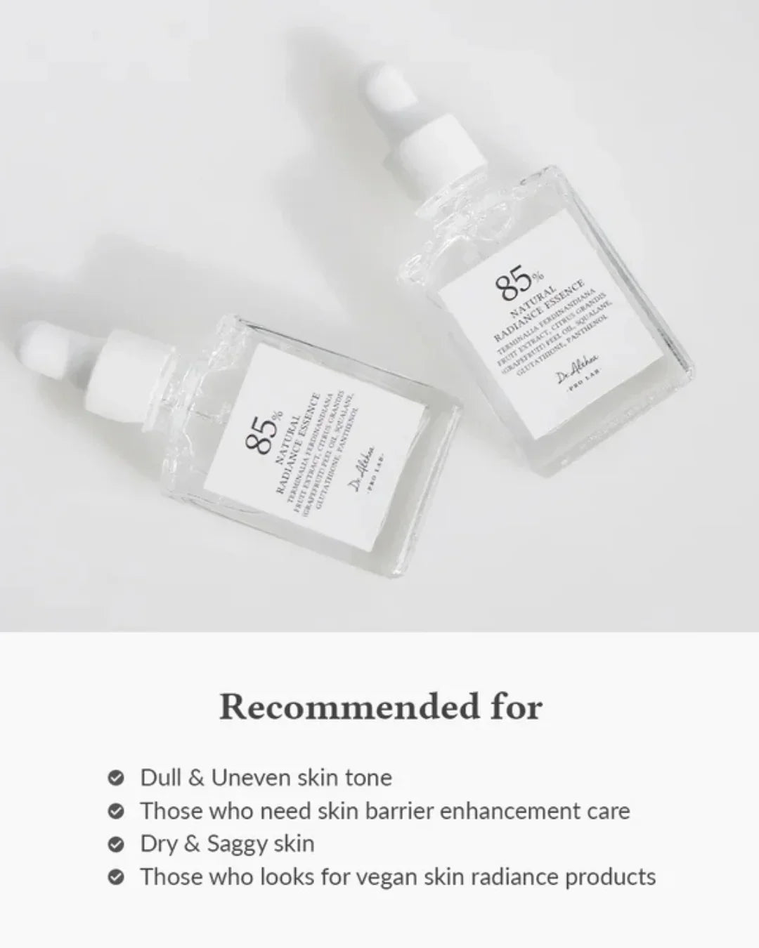 Two clear glass dropper bottles of 85% Natural Radiance Essence on white background, skincare serum